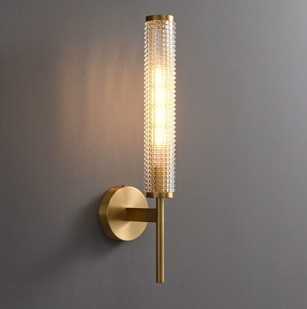 Vertical wall light illuminated with warm diffused glow